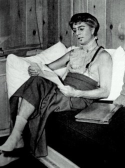 William Powell relaxing on the set of Love