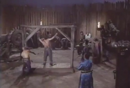 Wagon Train S07E04Robert Fuller (as Cooper Smith) intervenes when a prisoner is flogged by a sweaty,