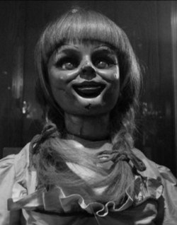 fatalitum:  One of the more popular horror symbols of 2013 was Annabelle, the creepy, disturbing, and flat out horrifying doll which played a small role in the Conjuring, a horror film based loosely on the Case Files of Ed and Lorraine Warren.  What