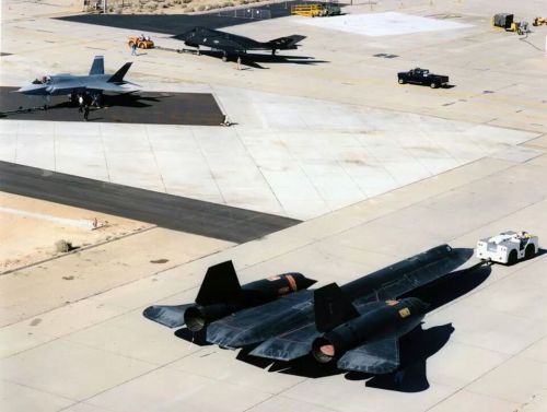 Generations. Three generations of aircraft developed by the Skunk Works: an F-117 Nighthawk, the X-3