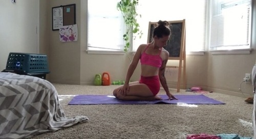 Some yoga after a crazy HIIT workout this morning. also: there is a toddler in that laundry basket c