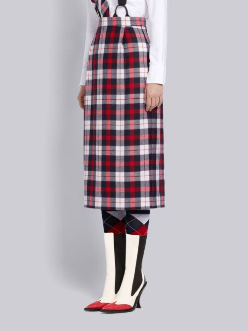 Who: Meghann Fahy as Sutton BradyWhat: Thom Browne Tricolor Wool Twill Tartan Check High Waisted Pen