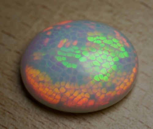 gorgeousgeology:Honeycomb Opal is made when growth becomes different due to changes in temperature, 