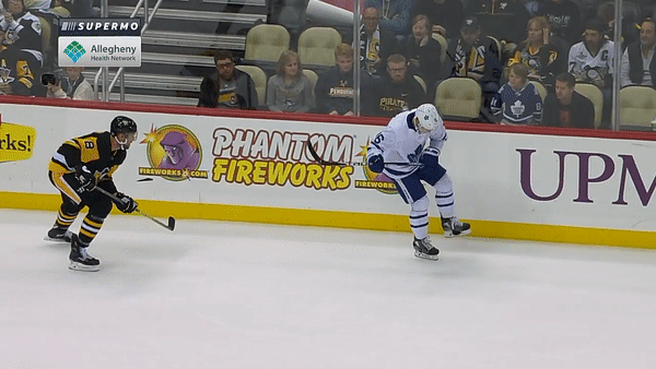 Mitch Marner with puck stuck in skate