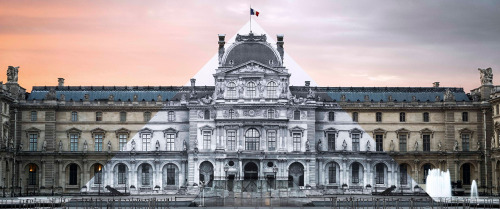 gravityhome:  Optical illusion at the Louvre in Paris. Artist JR covered the glass pyramid with a black and white image of the historic palace building. The second picture (by David Emeran) was taken when the project was still unfinished to let you see