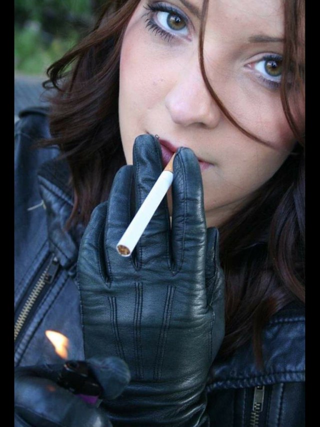 Smoking In Long Leather Gloves