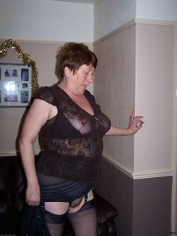 Agrannyadmirer:  I Want Her!   This Is One Sexy Granny In Her Sheer Black Lingerie!Find