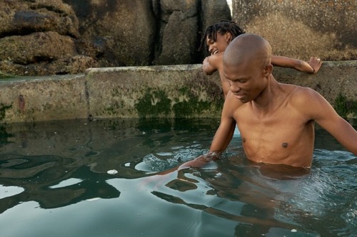 seawitchedd:This is Aza Mhlana and Shakes Fatman in a story about being men together in space, comfortable and with no pretence. A portrait of platonic intimacy. Photographer: Jonathan Kope