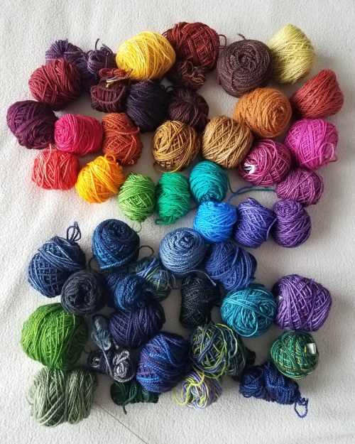 improbable-rainbows: colorful yarn by Laura on Flickr