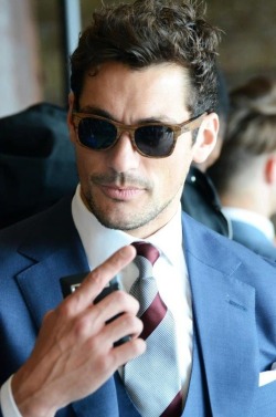 secretdaddy:  There are better sunglasses…but the tie’s a winner; and of course blue with vest = me all day… 