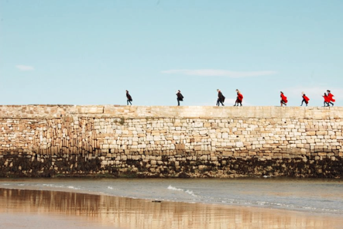 The Pier Walk is an ancient tradition at the University of St Andrews. Students wear their academic 
