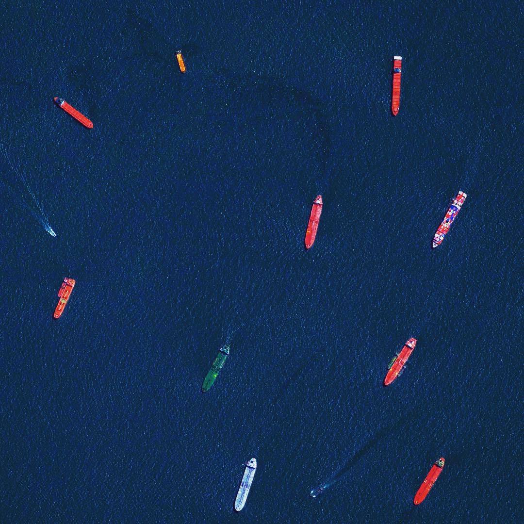 Cargo ships and tankers wait outside the entry to the Port of Singapore. The facility is the world’s second-busiest port in terms of total tonnage, shipping a fifth of the world’s cargo containers and half of the world’s annual supply of crude oil