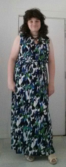 Full length dresses are rare in my size (over 6’ tall).[full body shot of a girl in a green, b
