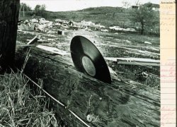 dolphinshark:  From the NOAA photo library, “The awesome power of a tornado demonstrated — a 33rpm plastic record blown into a telephone pole.” 