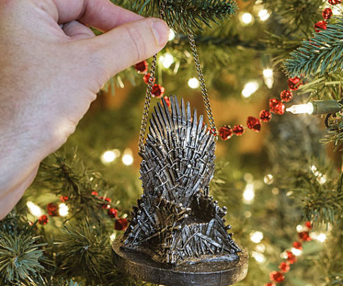 awesomeshityoucanbuy:  Iron Throne OrnamentChristmas is coming – greet the holidays in true Westeros style with the Iron Throne ornament. This officially licensed ornament sports a detailed replica of the iconic Iron Throne and comes with a small chain
