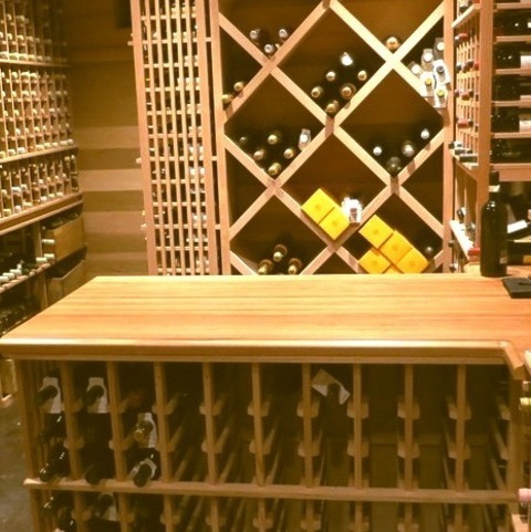 Wine Cellar ExpansiveWine Cellar - Huge Traditional Concrete Floor Wine Cellar Idea With Storage Racks