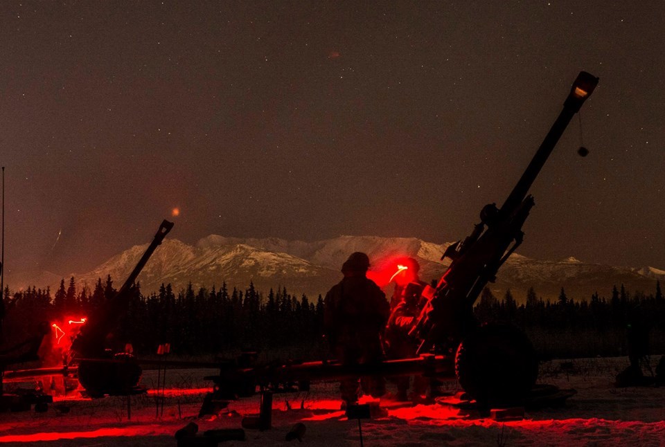 conqueringfools:
“ U.S. Army paratroopers assigned to 4th Brigade Combat Team (Airborne), 25th Infantry Division fire 105mm howitzers during a night-fire training event at Joint Base Elmendorf-Richardson, Alaska, Dec. 10, 2014. The U.S. Army Alaska...