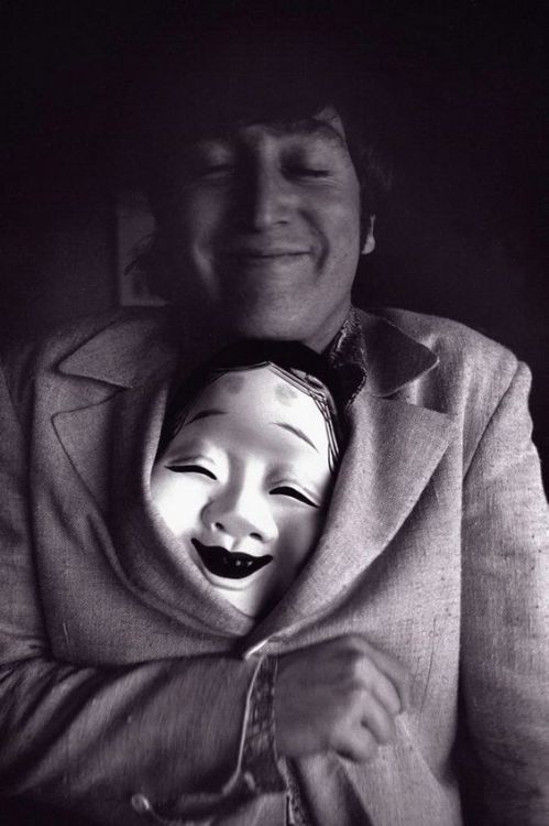 nostalgia-gallery: John Lennon with Otafuku (Japanese Noh mask)