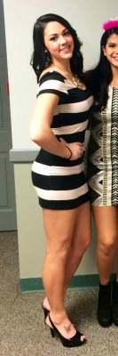 Rocking a tight striped dress and heels