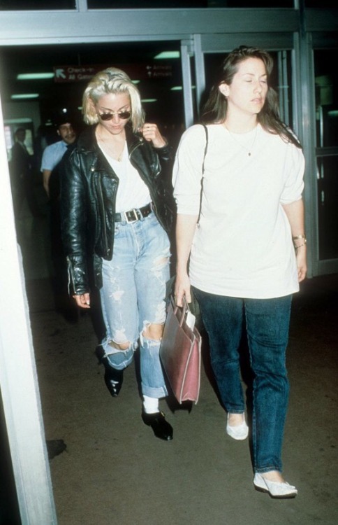 Madonna and her assistant Melissa Crowe at JFK airport, late 1988