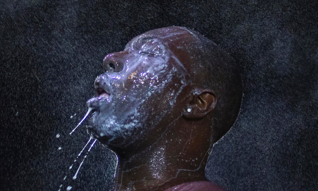 guardian:  From the picture desk: A man is doused with milk after being hit with