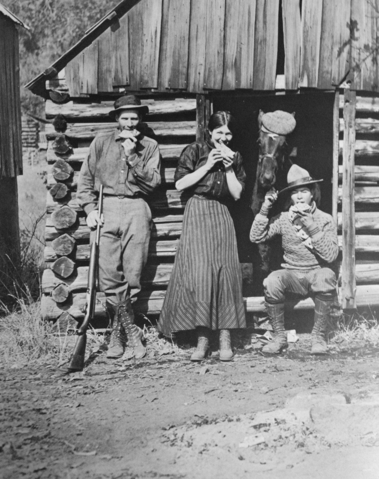 weirdvintage:  A country girl and her friends munch pie after a morning of hunting.