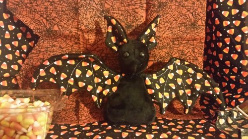 allyclaw:  Happy Halloween!!!!!!!  This little bat is made from minky and and cotton print fabric with cute candy corns! 8inches tall and a wing span of 15 inches with doll safety eyes!  She is indeed for SALE if anyone is interested send a note!! ์usd