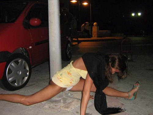 An attempt of public urination, maybe? Forgot to take off her panties? Hmmm. This is a miraculous si