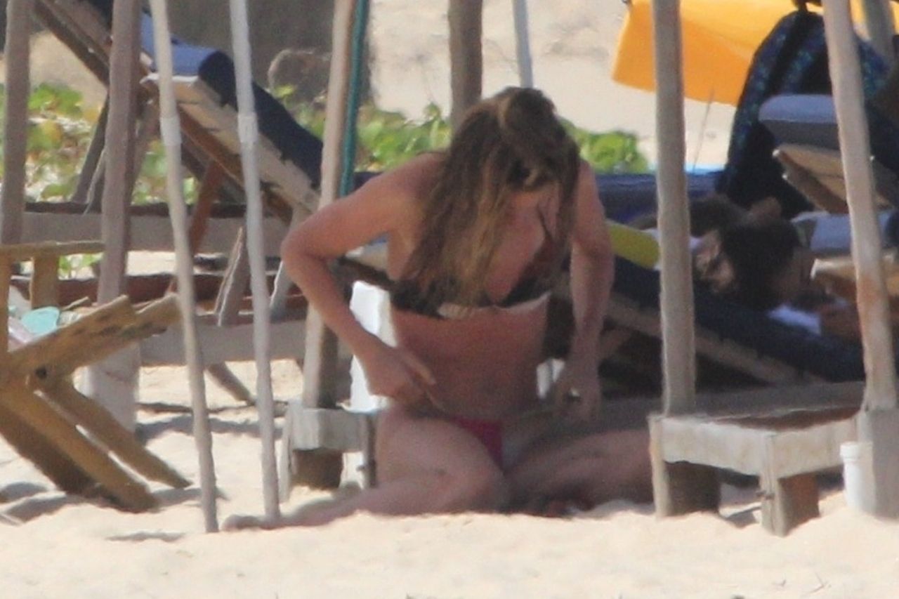 Doutzen Kroes Caught Sunbathing Topless