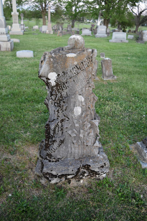 cemeteryconservation:One of the coolest headstones that I have seen in a while! The top of the log has stone carvers tools on it. I found out by the locals that the departed was a local stone carver and we found his signature on some of headstones in