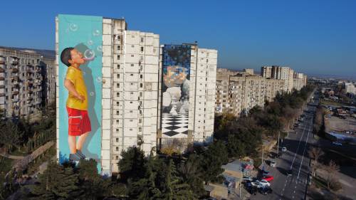 From Intricate Stencils To Vibrant Flowers, Nine New Murals Transform Blank Facades In Tbilisi