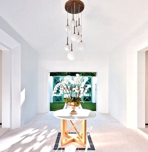 Contemporary Entry In OrlandoInspiration For A Large Contemporary Limestone Floor And White Floor Entryway
