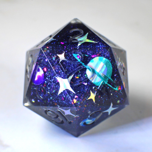 transmutationdice: Intergalactic. A space inspired d20 - numbers not painted.I’m new to tumblr, hell