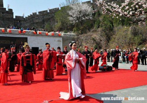  On April 11, the two came together as 21 married couples celebrated a traditional Chinese wedding c