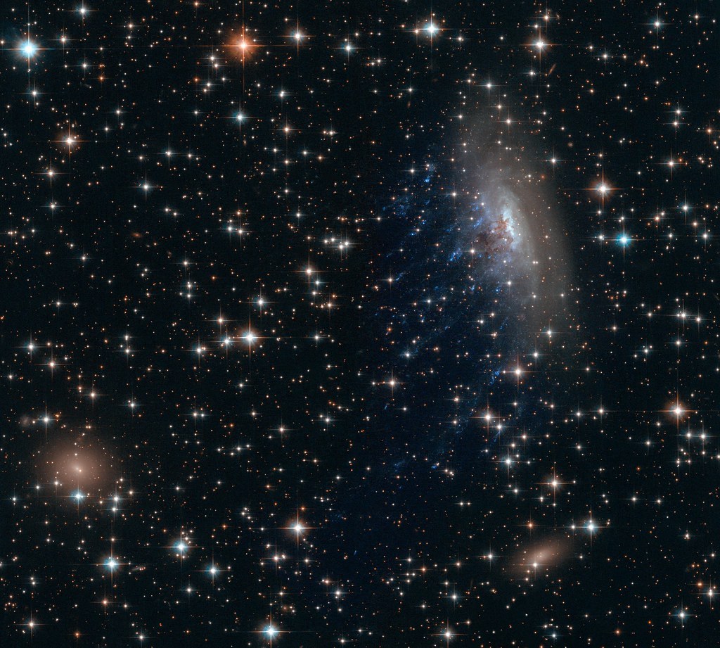 Tattered Spiral Galaxy ESO 137-001 by NASA Hubble