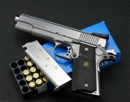 gunrunnerhell:  Detonics Scoremaster A rather obscure but sought after 1911. Although chambered in .45 ACP the Scoremaster was also available with a secondary barrel option allowing it to use an odd caliber, the .451 Detonics. The company itself has gone