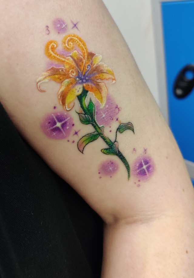 Rapunzel flower tattoo  Tangled tattoo Lillies tattoo Small tattoos