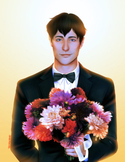 Shining baby boy Berthold with a bouquet