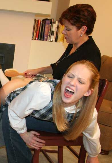 hardheadsoftbottom:When her mother applied the hairbrush to her daughters backside the reaction was 