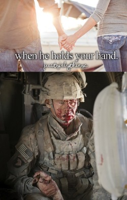 justwarthings:  Specialist Jacob William Moore holds the hand of his friend during a medevac in Afghanistan.