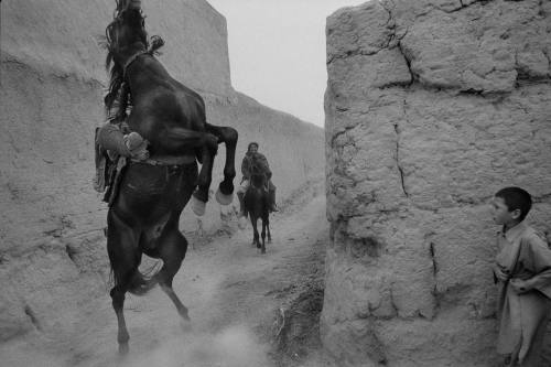 1st image: A mother and daughter returning home from work in the fields, Badakhshan Province, 2004. 