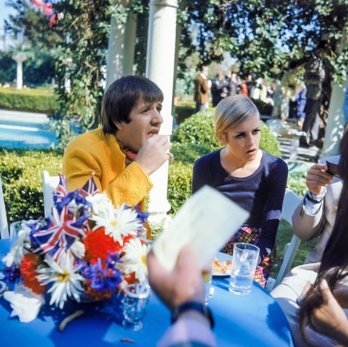 vintage-every-day: Twiggy, here with Sonny Bono, is the guest of honor at a party held at the house 