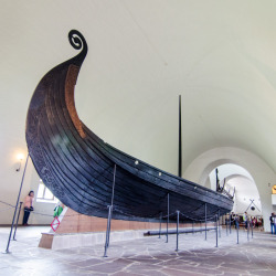 jeanpolfus:    Osebergskipet 820 AD at the Vikingskipshuset (the Viking Ships Museum) in Oslo, Norway. This ship was highly decorated and used for short, leisurely cruises.    