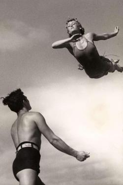 sub-textural:  24hoursinthelifeofawoman:  Woman performing a “swallow dive”, 1937.  Always graceful. “The bird dares to break the shell, then the shell breaks open and the bird can fly openly. This is the simplest principle of success. You dream,