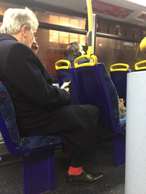 Daddy on the bus at Charring Cross. Love the red socks - very daring!