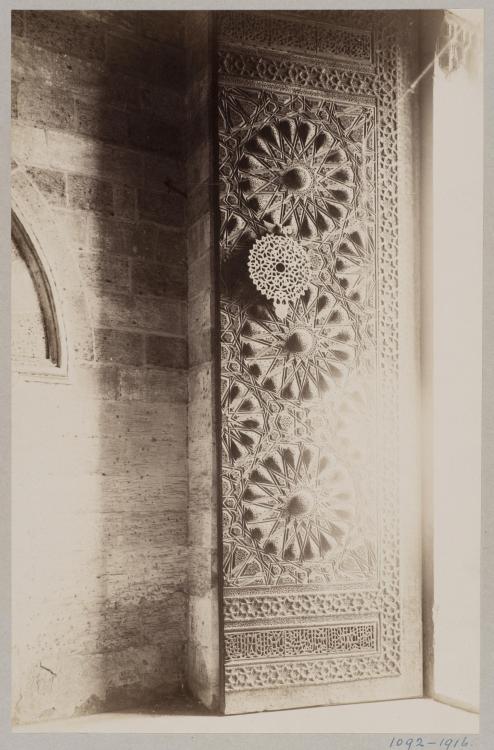 Past and Present: Entrance door of the funerary Mosque of Mamluk Sultan al-Mu'ayyad Shaykh, Cairo. L