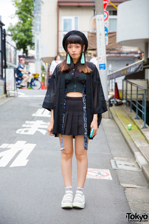 Urumi on the street in Harajuku wearing a sheer kimono sleeve jacket and corset top by DVMVGE along 