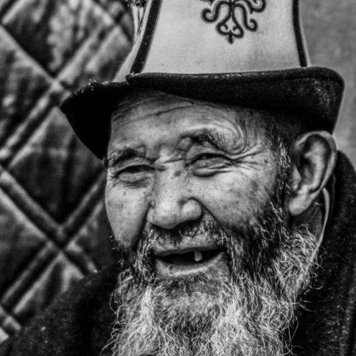 Portraits of ethnic Tajik, Kazakh, Russian, Uyghur, and Kyrgyz men in various hats in Xinjiang.Photo