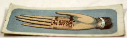 michaelmoonsbookshop:An optical illusion - a picture of an open hand with elongated printed text IF 