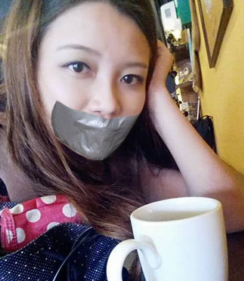  Asian Girl Fake tape gagged 